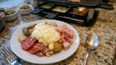 An easy raclette night: perfectly melted cheese with charcuterie