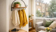 The indoor hose holder hack that tidies throws, towels and clutter in one go
